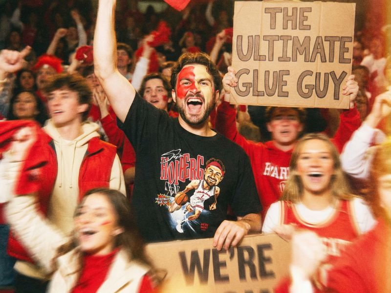 Fan wearing Glue Guy shirt at Nebraska basketball game